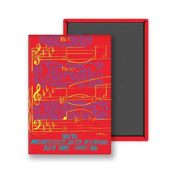 Un aimant vibrant, "Keith Haring et Andy Warhol, 1986", présente des notes de musique jaunes et un dessin abstrait au trait bleu sur fond rouge, inspiré par le 20e Festival de jazz de Montreux (du 3 au 19 juillet 1986).
