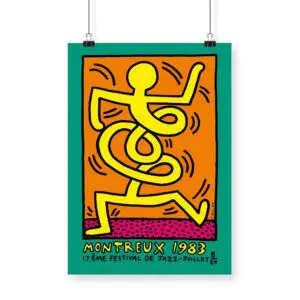 The "Poster Keith Haring, 1983 - Green" features a vibrant abstract yellow figure dancing on an orange background, outlined in bold black with green and pink borders, created for the Montreux Jazz Festival.