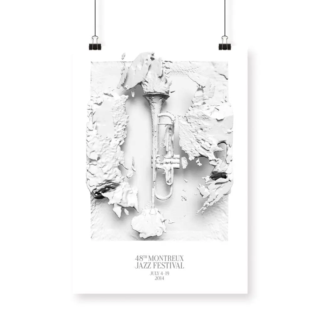 Une affiche blanche intitulée "Affiche Yoann Lemoine (Woodkid), 2014" présente un motif abstrait et texturé de trompette au centre, avec un texte en dessous : 48e Festival de Jazz de Montreux, du 4 au 19 juillet 2014. L'affiche est suspendue par deux clips noirs.
