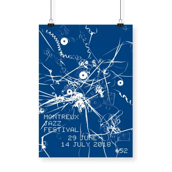 Poster Christian Marclay, 2018: Abstract blue design with white tangled audio cords, cassette tapes, and audio jacks. Text: Montreux Jazz Festival, 29 June - 14 July 2018, #52.