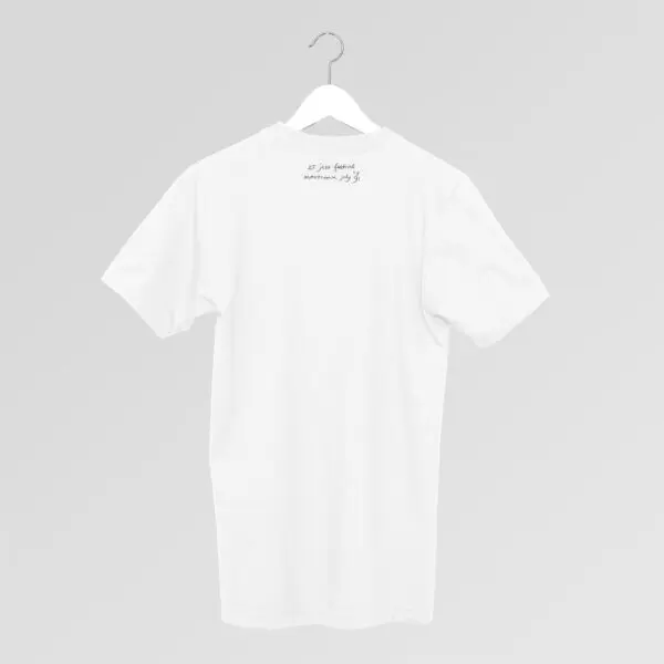 A plain white T-Shirt Max Bill, 1991 hangs with its back facing forward, showing small handwritten-style text near the neck area.