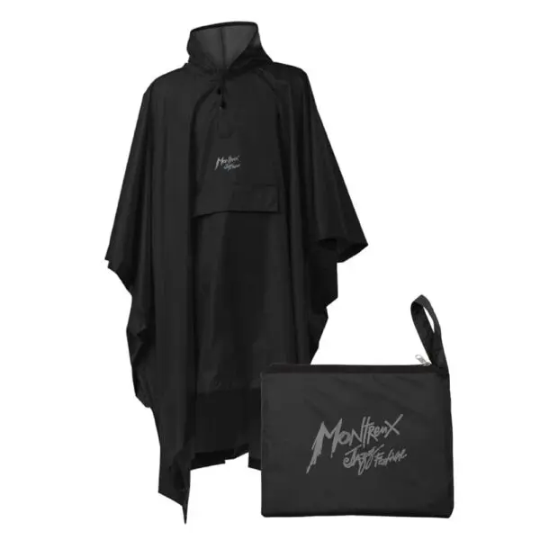 Rain Poncho Durable Montreux Festival edition with iconic logo on the chest, shown next to a matching zippered pouch bearing the same emblem, both displayed on a plain white background.
