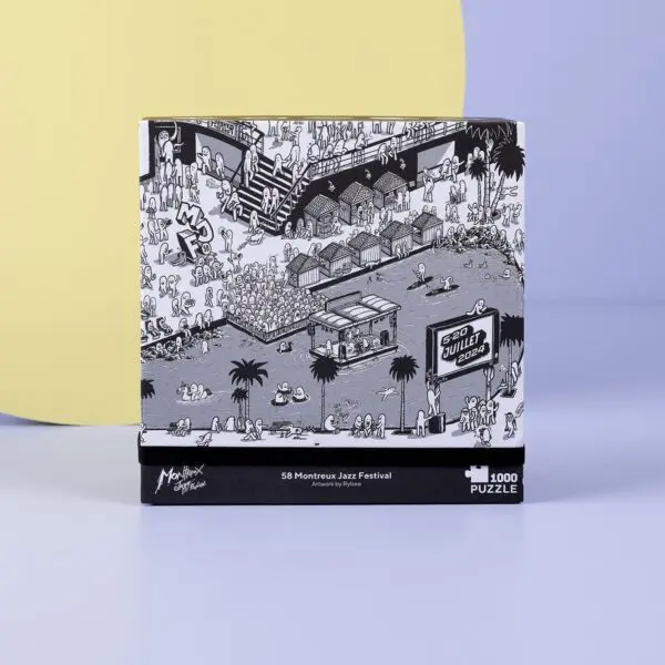 The 1000 Piece Rylsee Puzzle showcases a black-and-white Montreux Jazz Festival scene—crowds, stages, palm trees, and signage—set on a light purple background with a bold yellow accent.