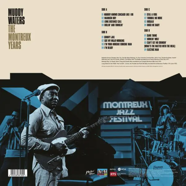 Black-and-white photo of Muddy Waters playing guitar on stage at Montreux Jazz Festival with band and signage. Album tracks and credits featured on this classic release, "Muddy Waters, The Montreux Years, Double Vinyl.