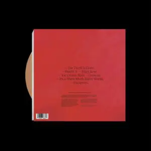 Pochette de disque en vinyle rouge avec une liste de titres de chansons au centre, dont The Thrill Is Gone, Worth It, Mary Jane, Ice Cream Man, Genesis, Its a Mans Mans World et Escapism.