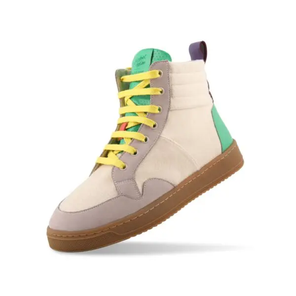 The Lakeside Wooler Sneaker by Baabuk, Limited Edition, is a stylish high-top with yellow laces, a beige and gray upper, green accents, brown sole, and purple pull tab at the back, inspired by the Montreux Festival and shown on a white background.